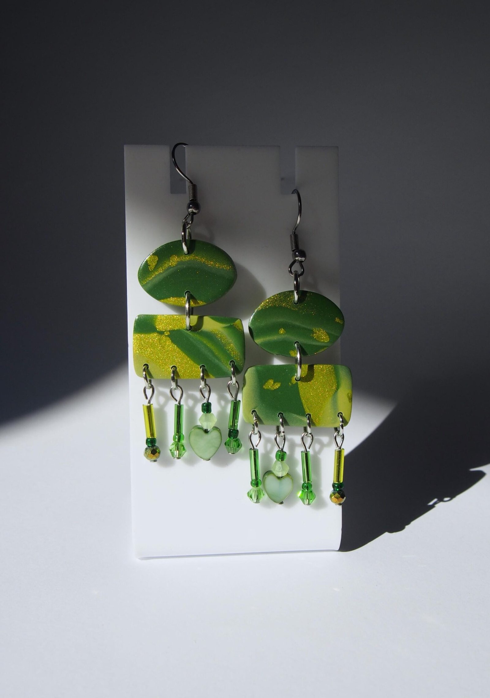 Shimmering Green Boho Earrings: Geometric Heart Dangles - Image 3