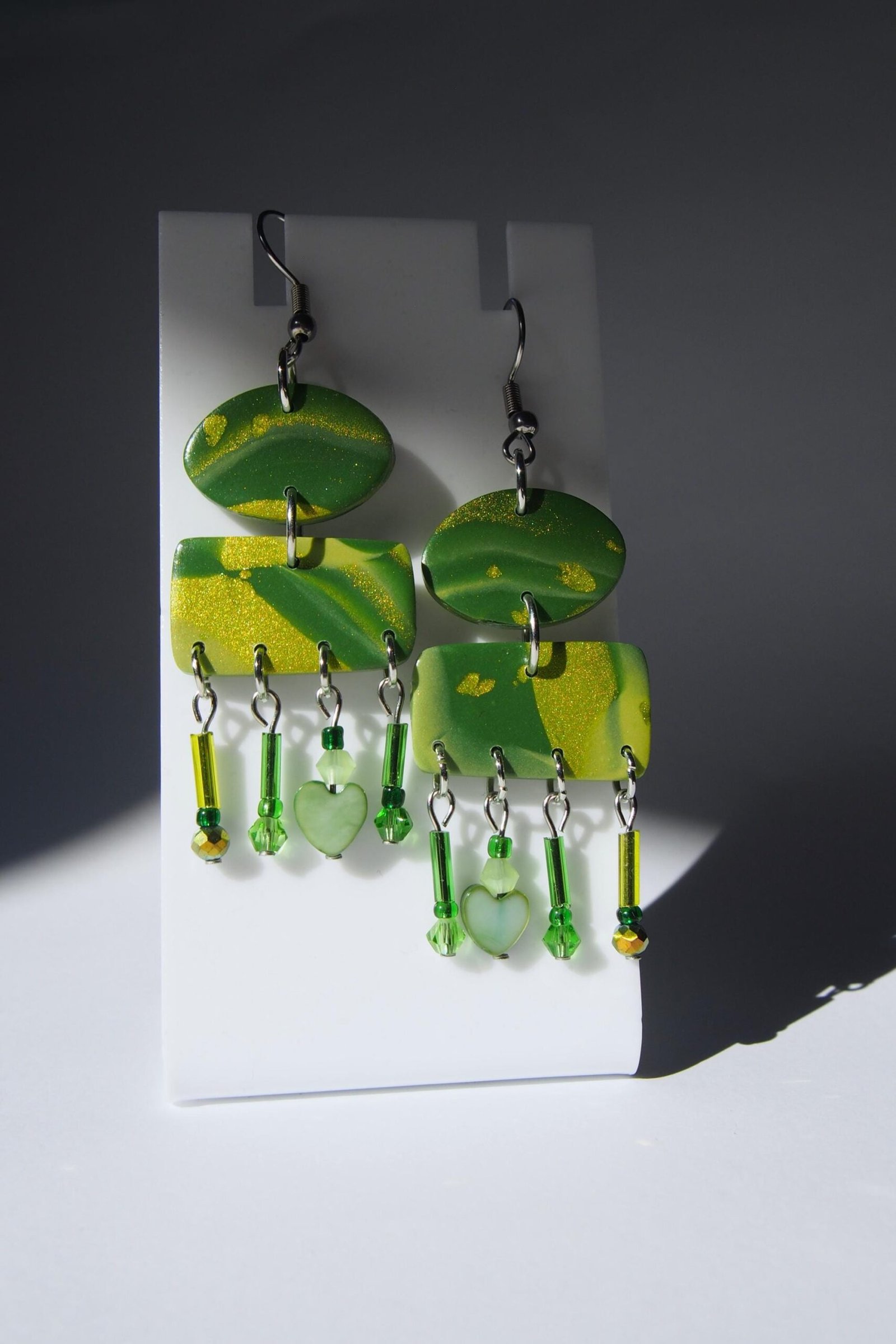 Shimmering Green Boho Earrings: Geometric Heart Dangles - Image 2