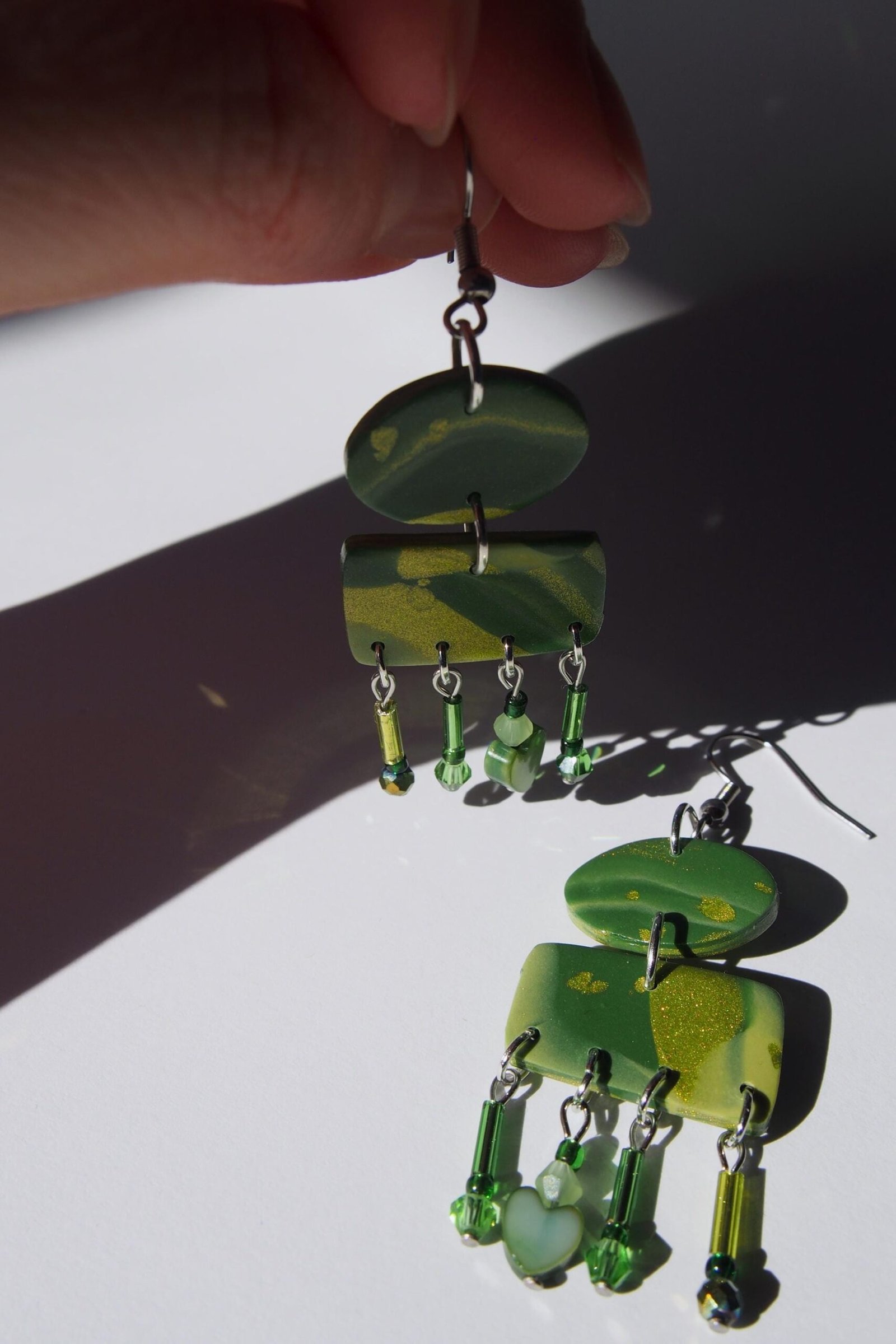 Shimmering Green Boho Earrings: Geometric Heart Dangles - Image 7