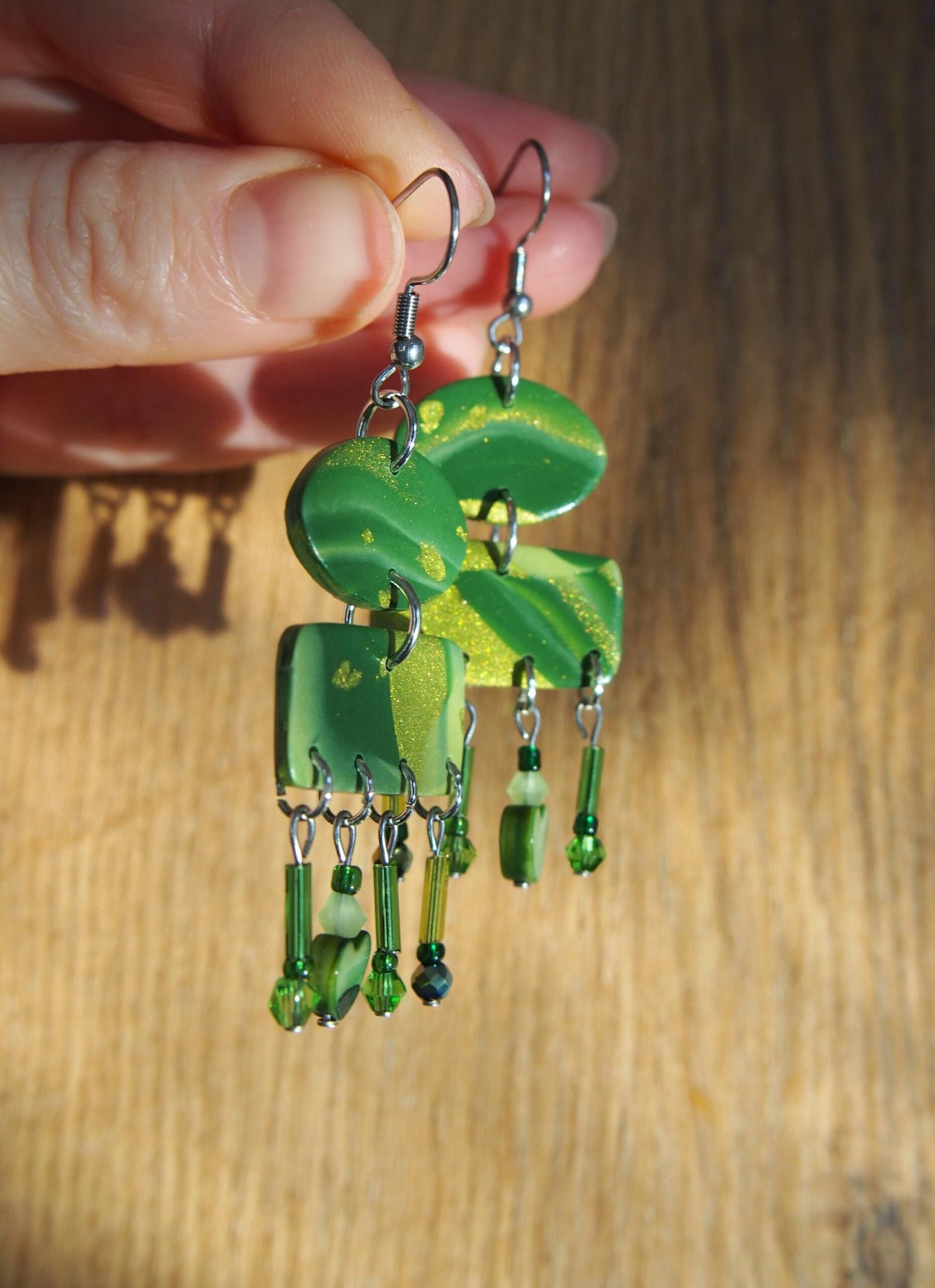 Shimmering Green Boho Earrings: Geometric Heart Dangles - Image 5